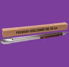 Grillzange vor einem lila Hintergrund